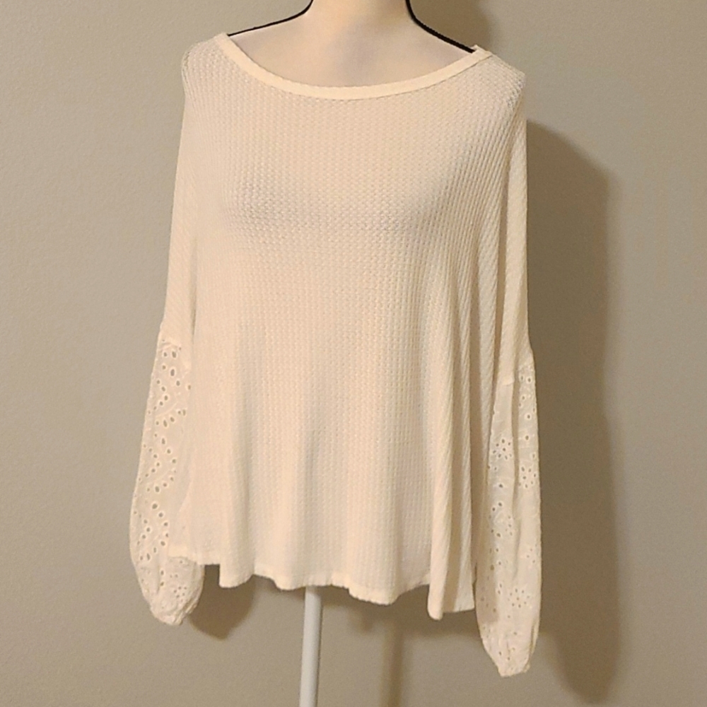 Story knit eyelit sleeve top